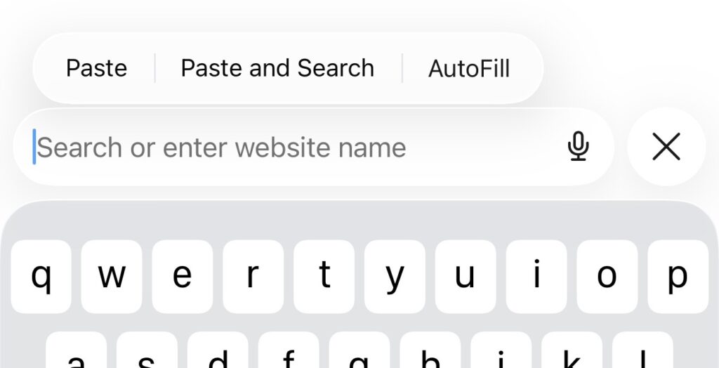 Screenshot of Safari and the URL/search line that reads "Search or enter website name" and a menu above it with the options "Paste", "Paste and Search", and "AutoFill".